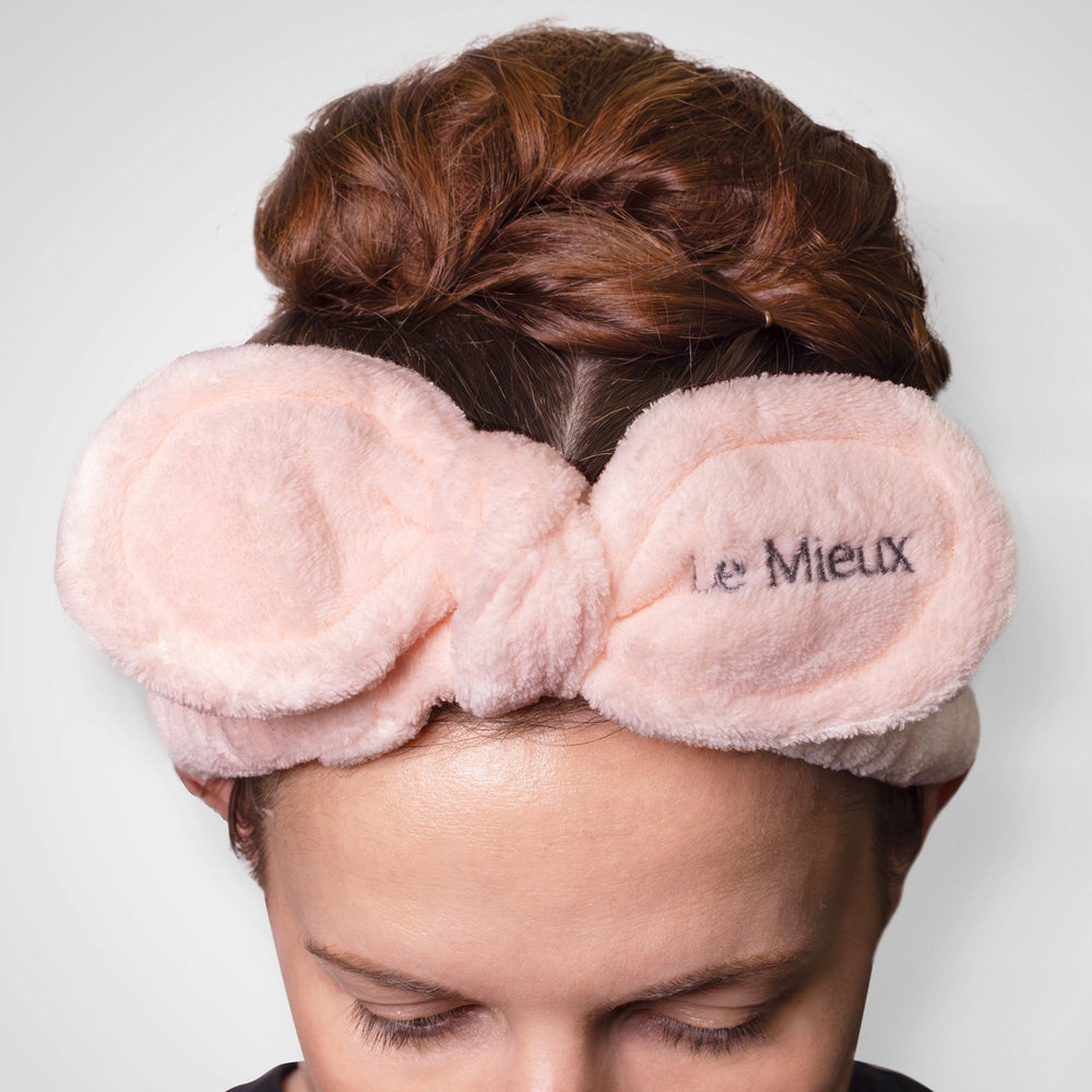 Le Mieux beauty headband with soft fabric, designed for skincare and makeup application, shown in a neutral color.