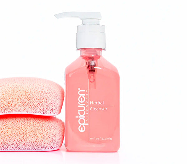 Epicuren Discovery Herbal Cleanser in a stylish bathroom setting, showcasing its natural ingredients and creamy texture.