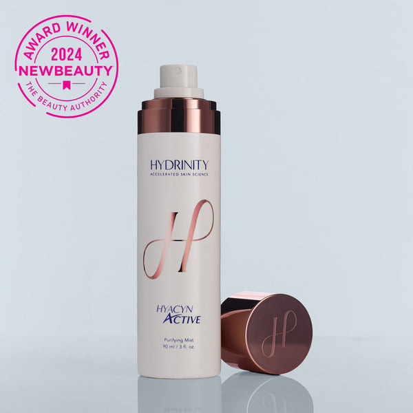 Hydrinity Hyacyn Active cleanser with cap off, showcasing the creamy formula and sleek packaging.