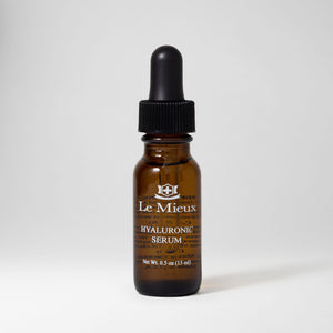 Le Mieux Hyaluronic Serum in a 0.5oz bottle, featuring clear liquid serum with a dropper cap for hydrating skincare.
