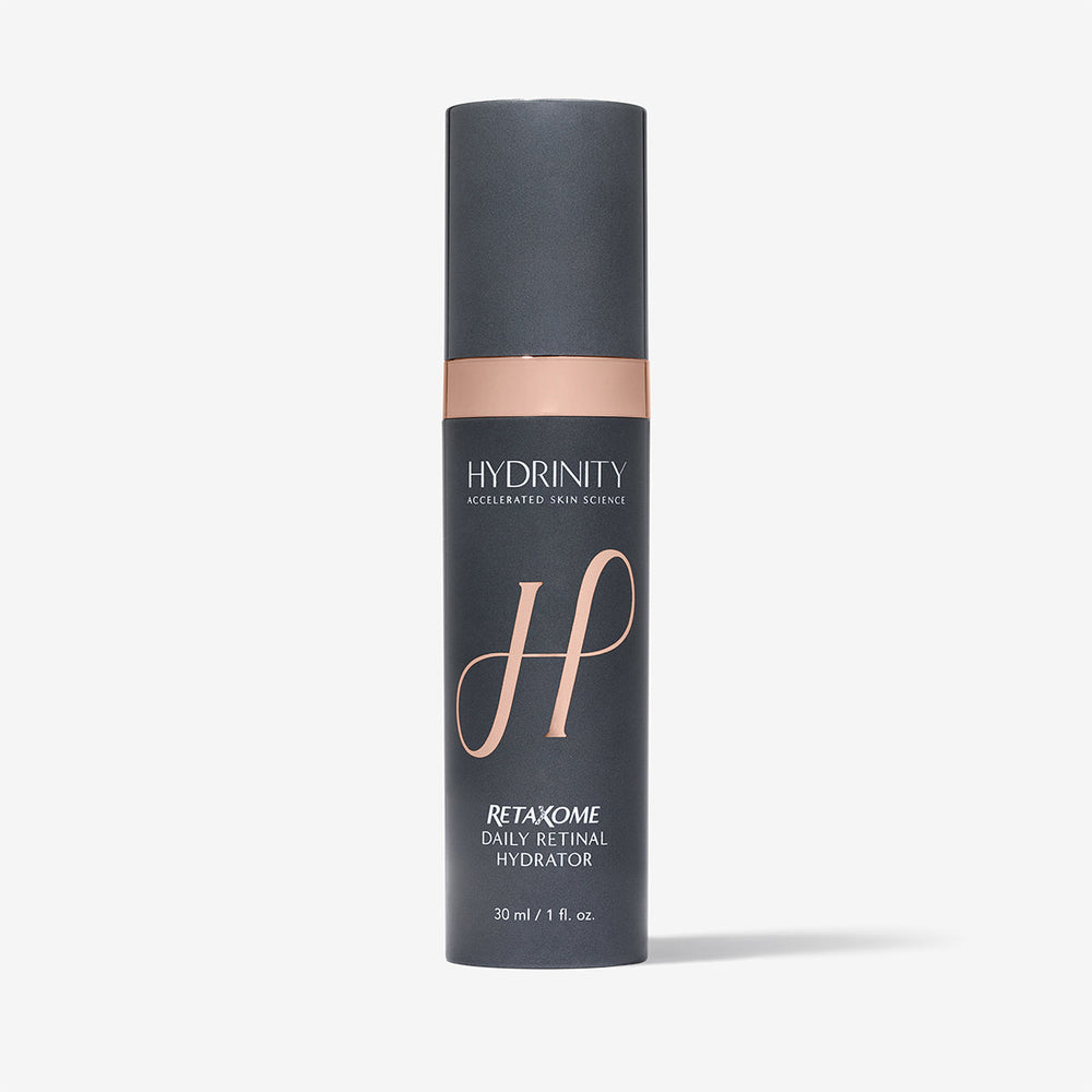 Hydrinity RetaXome Daily Retinal Hydrator in a grey jar, a skincare product for nightly retinal treatment and hydration.