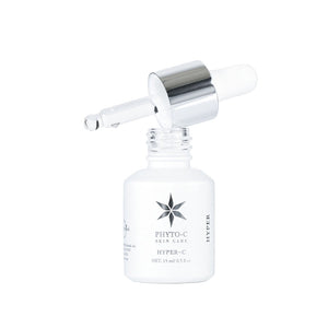 Phyto-C Skin Care HYPER-C serum in a 15 ml bottle with a dropper, showcasing its smooth texture and vibrant packaging.