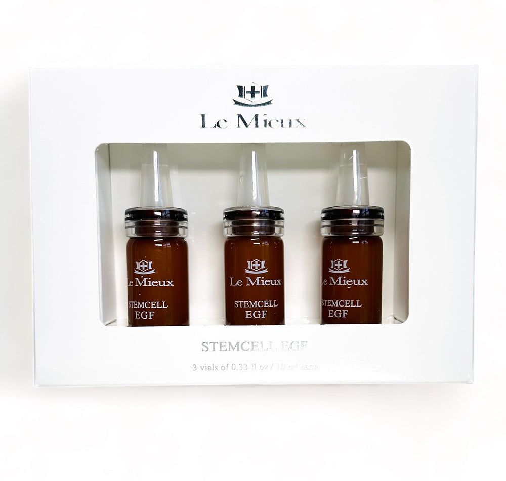 Le Mieux Derma Miracle Working Ampoules Serum featuring clear vials with a light liquid and a dropper for application.
