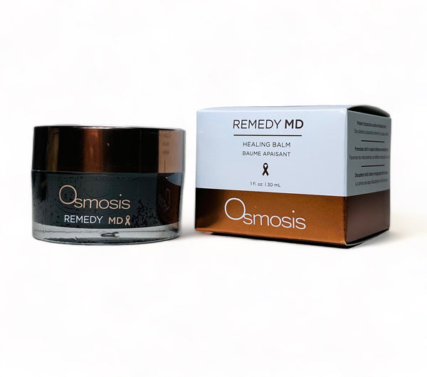 Osmosis Beauty Remedy MD Healing Balm serum in a sleek container, showcasing its rich, creamy texture.