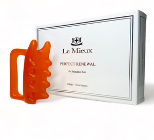 Le Mieux Swipe and Glow Perfect Renewal exfoliant with included fascia face massager displayed on a clean background.