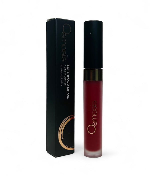 Osmosis Beauty Superfood Lip Oil in a sleek applicator, showcasing a vibrant, glossy finish and rich color.