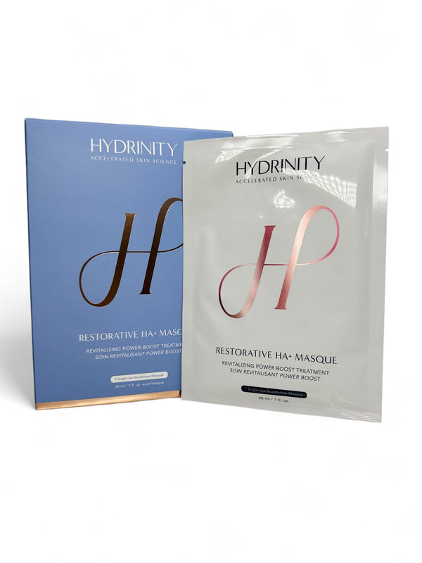 Hydrinity Restorative HA+ Face Mask in a jar, showcasing its creamy texture and vibrant packaging for revitalizing skin treatment.