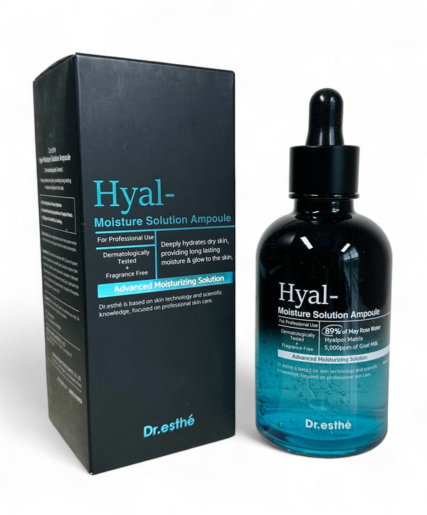 Dr. Esthe Hyal Moisture Solution Ampoule 150ml with a roller face massager on a clean surface.