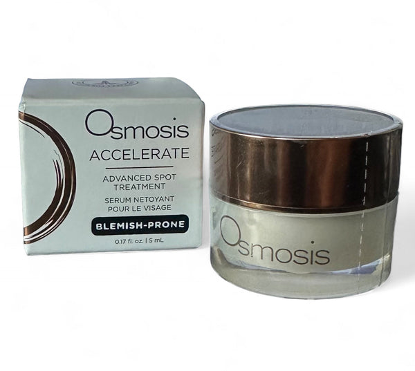 Osmosis Beauty Accelerate Advanced Spot Treatment serum in a dropper bottle with a clear liquid inside.