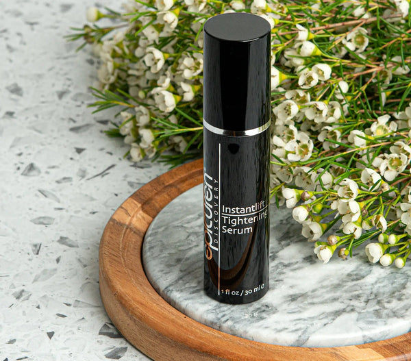 Epicuren Discovery Instantlift Tightening Serum in a sleek bottle with a dropper, designed for anti-aging skincare.