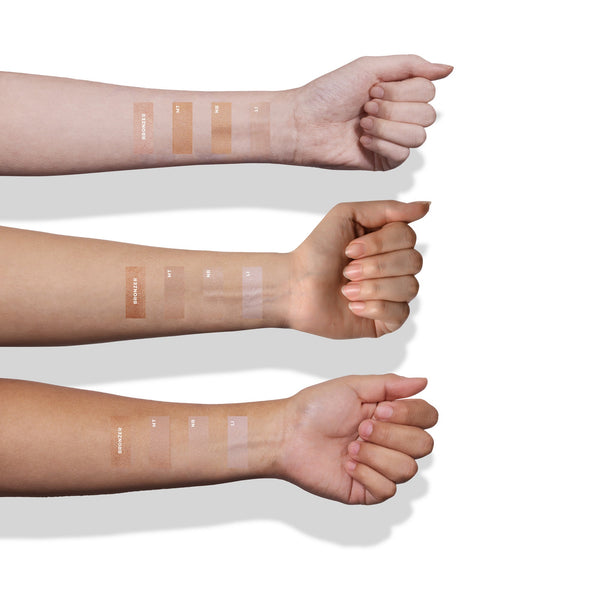 Swatches of Le Mieux Just Glow BB Cream in sun care product, showing different shades on a neutral background.