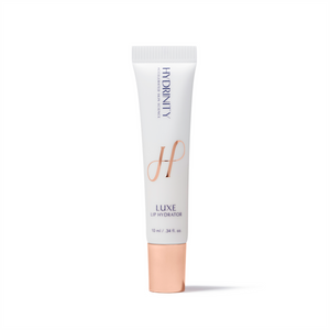 Hydrinity LUXE Lip Hydrator in a sleek tube, showcasing a creamy texture for hydration and lip care.