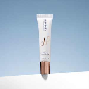 Hydrinity LUXE Lip Hydrator in a sleek tube, designed for moisturizing lips and enhancing hydration.