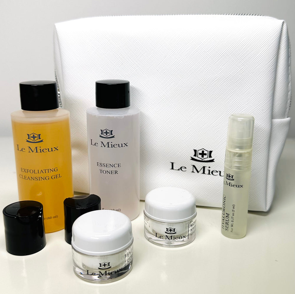 Le Mieux Clear Skin Beauty Essentials moisturizers in a group display, showcasing sleek packaging and a clear skin focus.