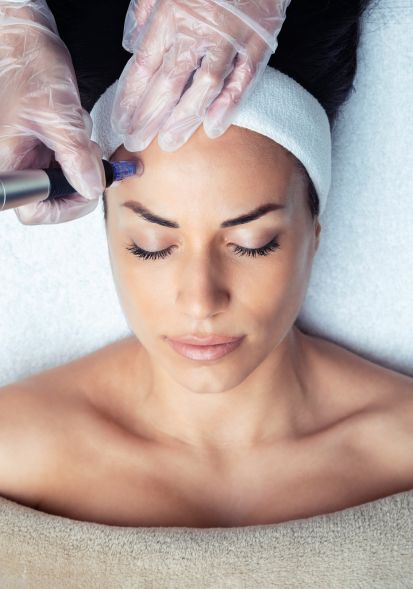 Customized facial voucher featuring microneedling treatment at The Aesthetics Spa, showcasing a serene spa environment.