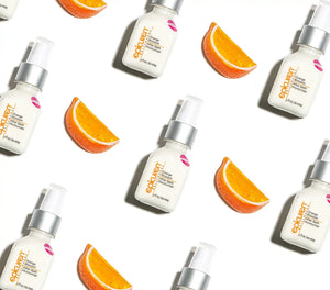 Epicuren Discovery After Bath Body Moisturizer in Orange Blossom, showcasing creamy texture and vibrant orange floral design.