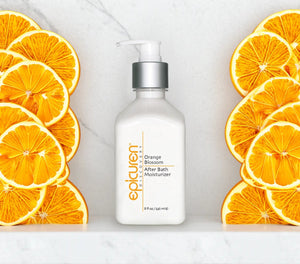 Epicuren Discovery After Bath Body Moisturizer in Orange Blossom, showcasing a creamy texture and vibrant floral scent.