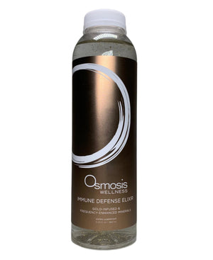 Osmosis Beauty Immune Defense Elixir with gold infusion and frequency-enhanced minerals, in a clear glass bottle.
