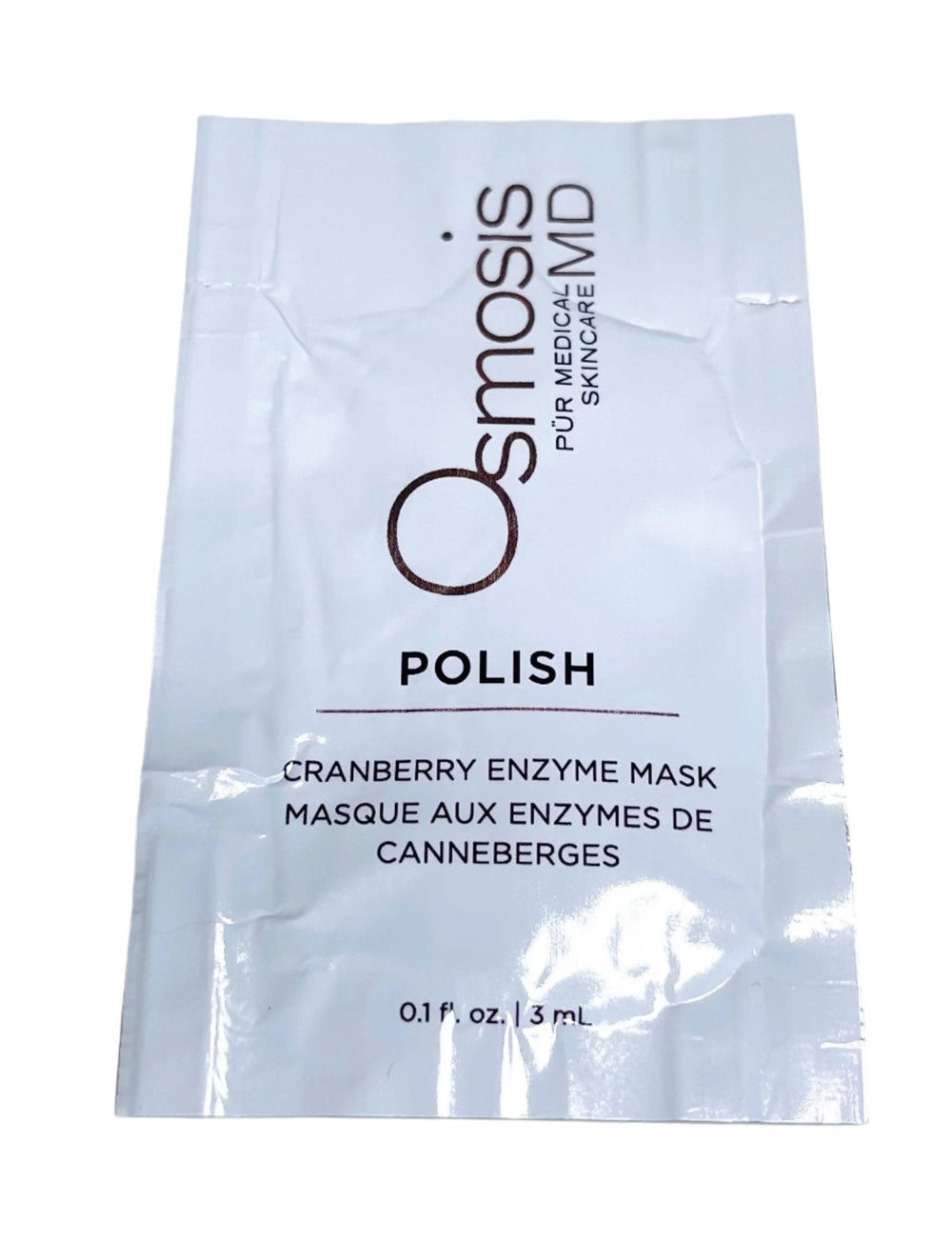Osmosis MD Polish Cranberry Enzyme Mask in a 4.5 ml tube, showcasing the product's vibrant cranberry color and texture.