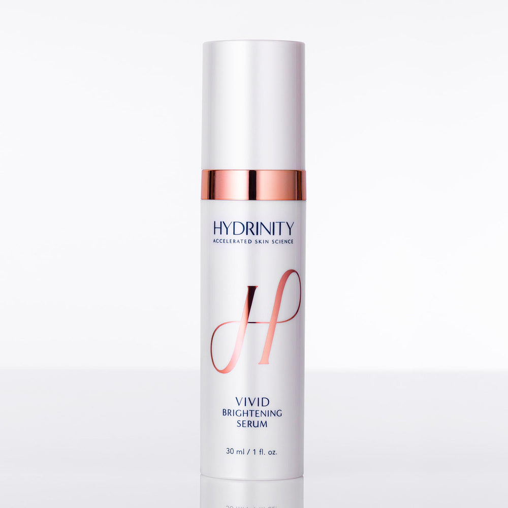 Hydrinity Vivid Brightening Serum in a clear dropper bottle with a vibrant texture, showcasing its brightening properties.