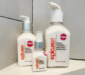 Epicuren Discovery Papaya Pineapple After Bath body care product displayed in a lifestyle setting with tropical elements.