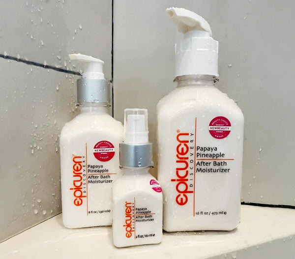 Epicuren Discovery Papaya Pineapple After Bath body care product displayed in a lifestyle setting with tropical elements.