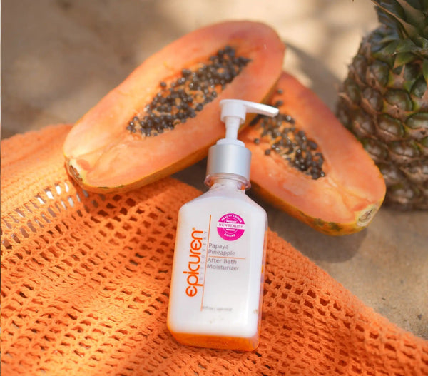 Epicuren Discovery Papaya Pineapple After Bath body care product in a vibrant lifestyle setting with tropical accents.