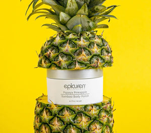 Epicuren Discovery Papaya Pineapple Bamboo Body Polish in a stylish container, showcasing its tropical ingredients and texture.