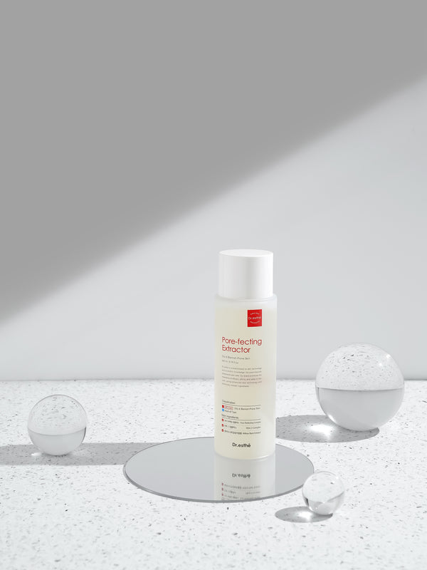 Dr. Esthe Pore-Fecting Extractor 200mL bottle designed for acne treatment with a sleek, modern design.