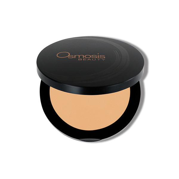 Osmosis Beauty Mineral Pressed Base compact in Golden Medium, showcasing the smooth powder texture and sleek packaging.
