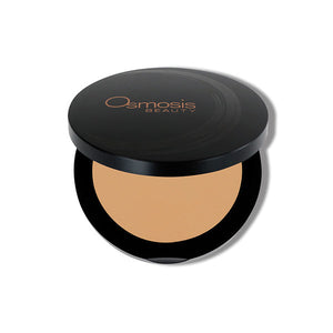 Osmosis Beauty Mineral Pressed Base compact in Natural Dark shade with a smooth finish and sleek packaging.