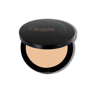 Osmosis Beauty Mineral Pressed Base compact in Natural Light with a smooth, matte finish for even skin tone.