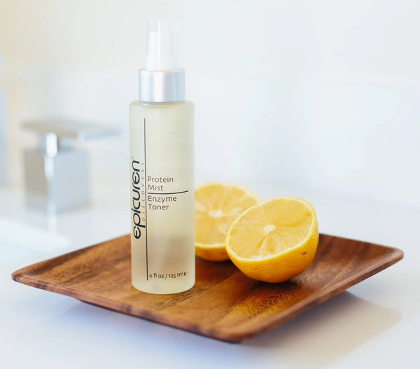 Epicuren Discovery Protein Mist Enzyme Toner in a 4 Fl Oz bottle with a refreshing mist spray in a natural setting.