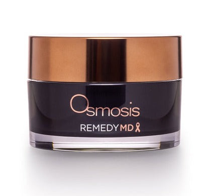 Osmosis Beauty Remedy MD Healing Balm serum in a sleek container, showcasing its rich, creamy texture.