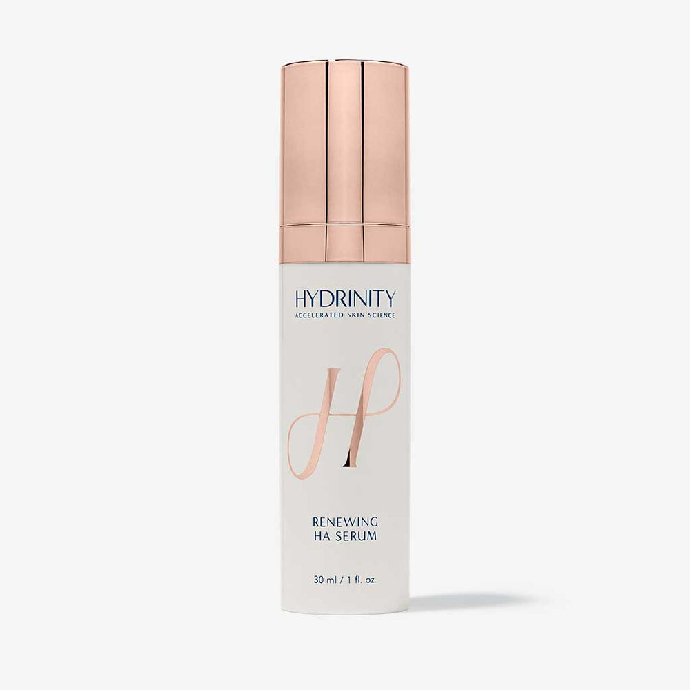 Hydrinity Renewing HA Serum in a clear glass dropper bottle, showcasing the face serum for hydration and skin renewal.
