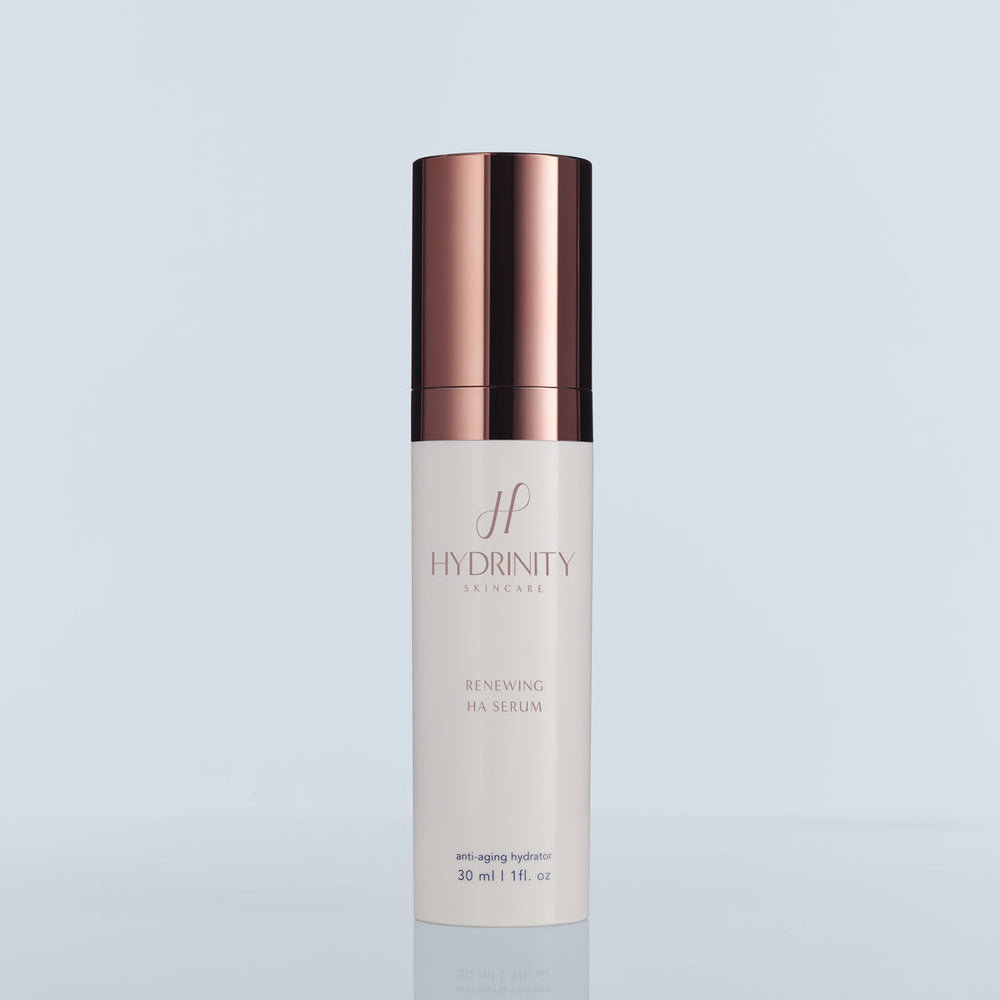 Hydrinity Renewing HA Serum with PPM⁶ technology in a sleek blue box, showcasing the face serum's elegant packaging.