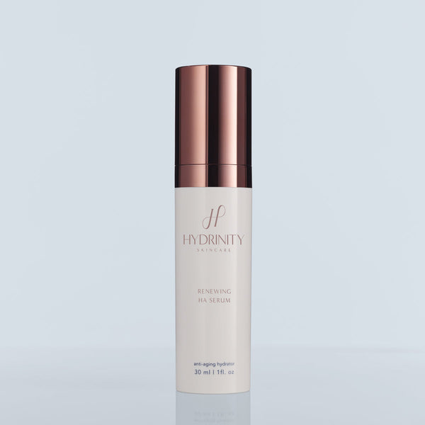 Hydrinity Renewing HA Serum with PPM⁶ Technology in a clear bottle, showcasing its lightweight texture for skincare.