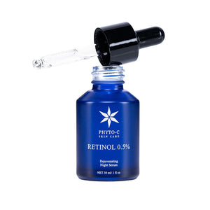 Phyto-C Skin Care Retinol 0.5% Night Serum in a glass dropper bottle with a dark background.