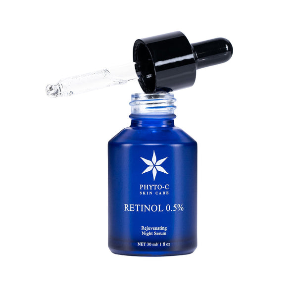 Phyto-C Skin Care Retinol 0.5% Night Serum in a glass dropper bottle with a dark background.