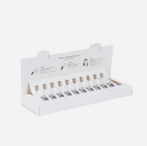 Skinbolic Trinity Calming Ampoule set of 10, featuring small vials with soothing serum for skin care.
