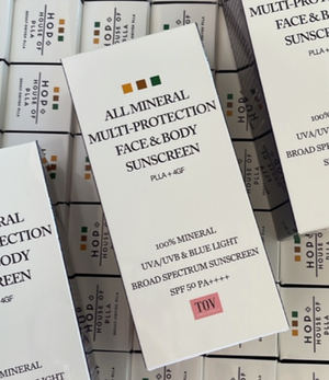 TOV All Mineral Multi-Protection Face & Body Sunscreen in a 50ml tube with a sleek design and easy-to-use cap.