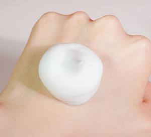 TOV House of PLLA HOP+ Pro Volumizing Mousse 150ml bottle with foaming cleanser texture on a clean surface.