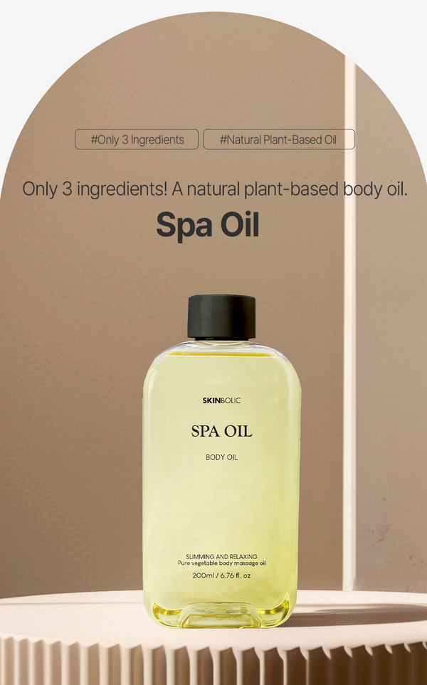 Skinbolic Spa Oil 200mL serum in a clear bottle with a dropper, showcasing its lightweight texture and luxurious appearance.