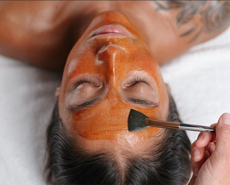 Customized facial voucher from The Aesthetics Spa featuring skincare treatment details and aesthetic design.