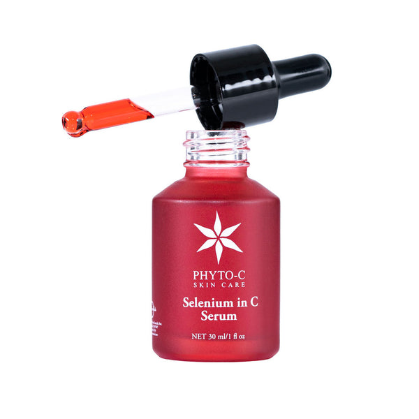 Phyto-C Skin Care Selenium in C Serum 30 ml bottle with dropper, showcasing a clear serum texture against a white background.