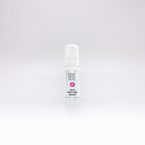 NeoGenesis Skin Restore Serum in a 5mL bottle, showcasing its sleek design and rich, hydrating formula.