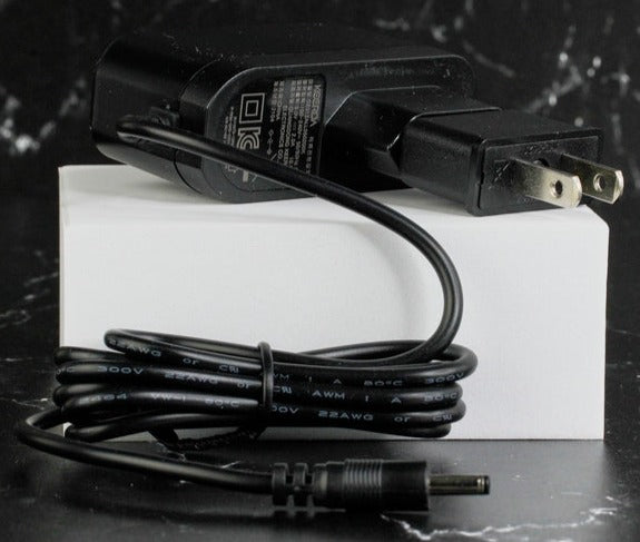 Tov Beauty Time Master Pro silver power adapter charging cable with connectors and a sleek design for easy use.