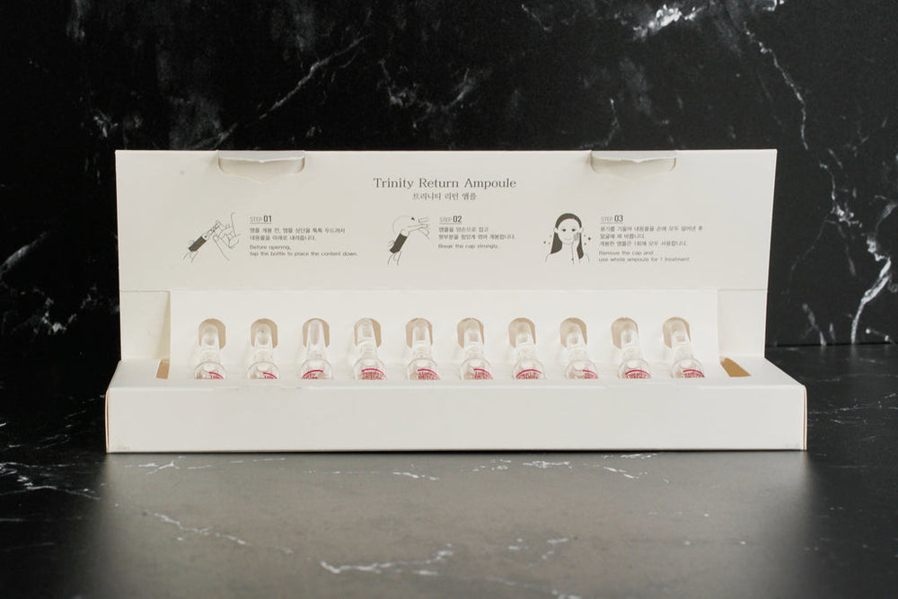 Skinbolic Trinity Return Ampoule set of 10, featuring individual ampoules in a sleek packaging design.