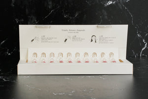 Skinbolic Trinity Return Ampoule set of 10, featuring sleek vials with a clear serum for skin rejuvenation.