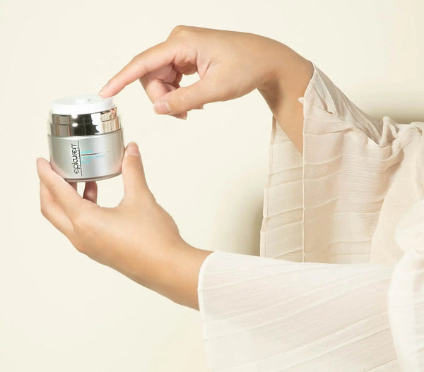 Epicuren Discovery Soothe Dermal Repair Balm in a 1 Fl Oz container, shown in a relaxing lifestyle setting.